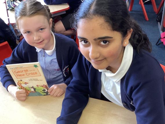 Communication : Reading together shared by Book Buddies 4JM with 7NT 
